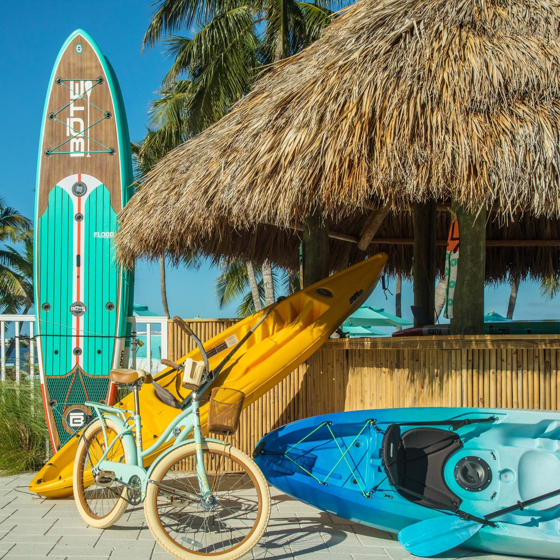 paddleboards, kayaks and a bicycle