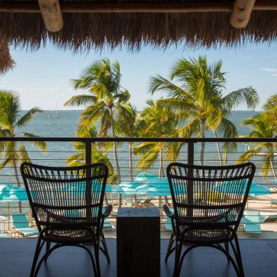 outdoor seating looking out on the beach and water