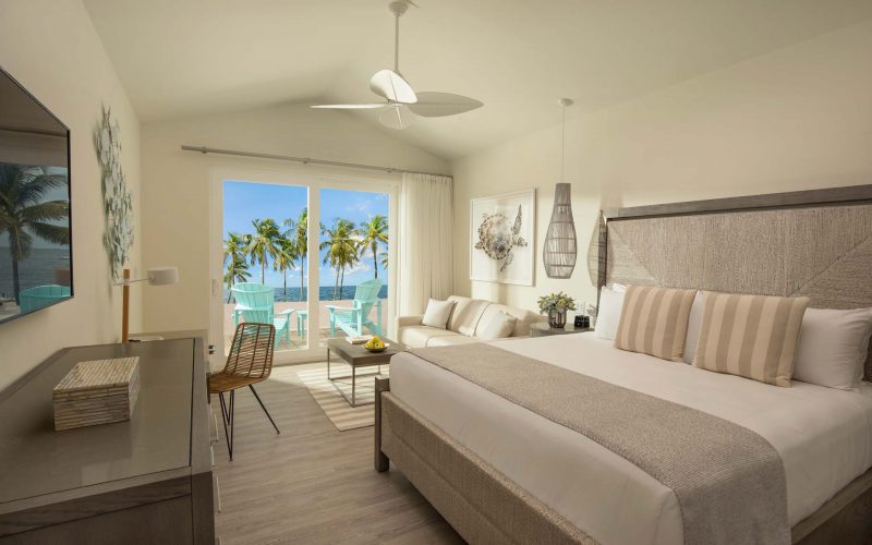 interview view of beach front bungalow with king bed