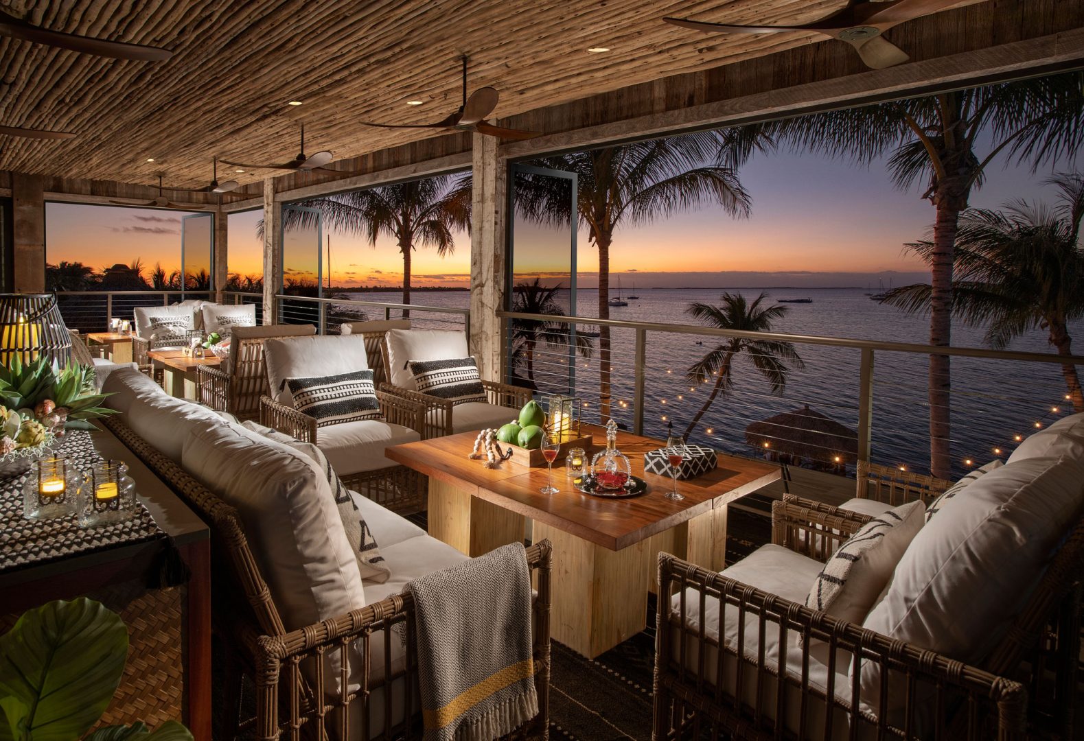 Bamboo-styled indoor lounge with water view