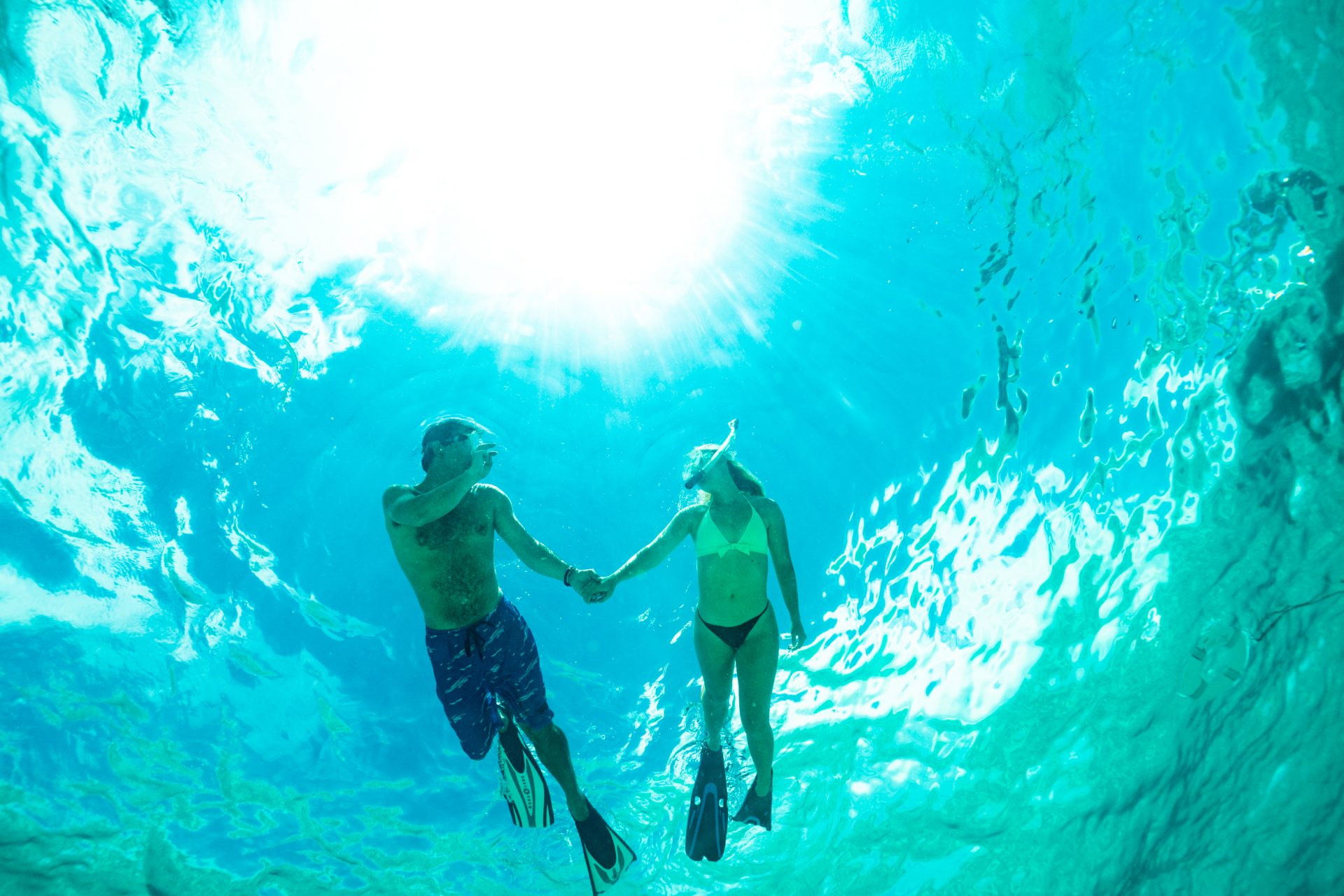 a couple snorkeling in the ocean